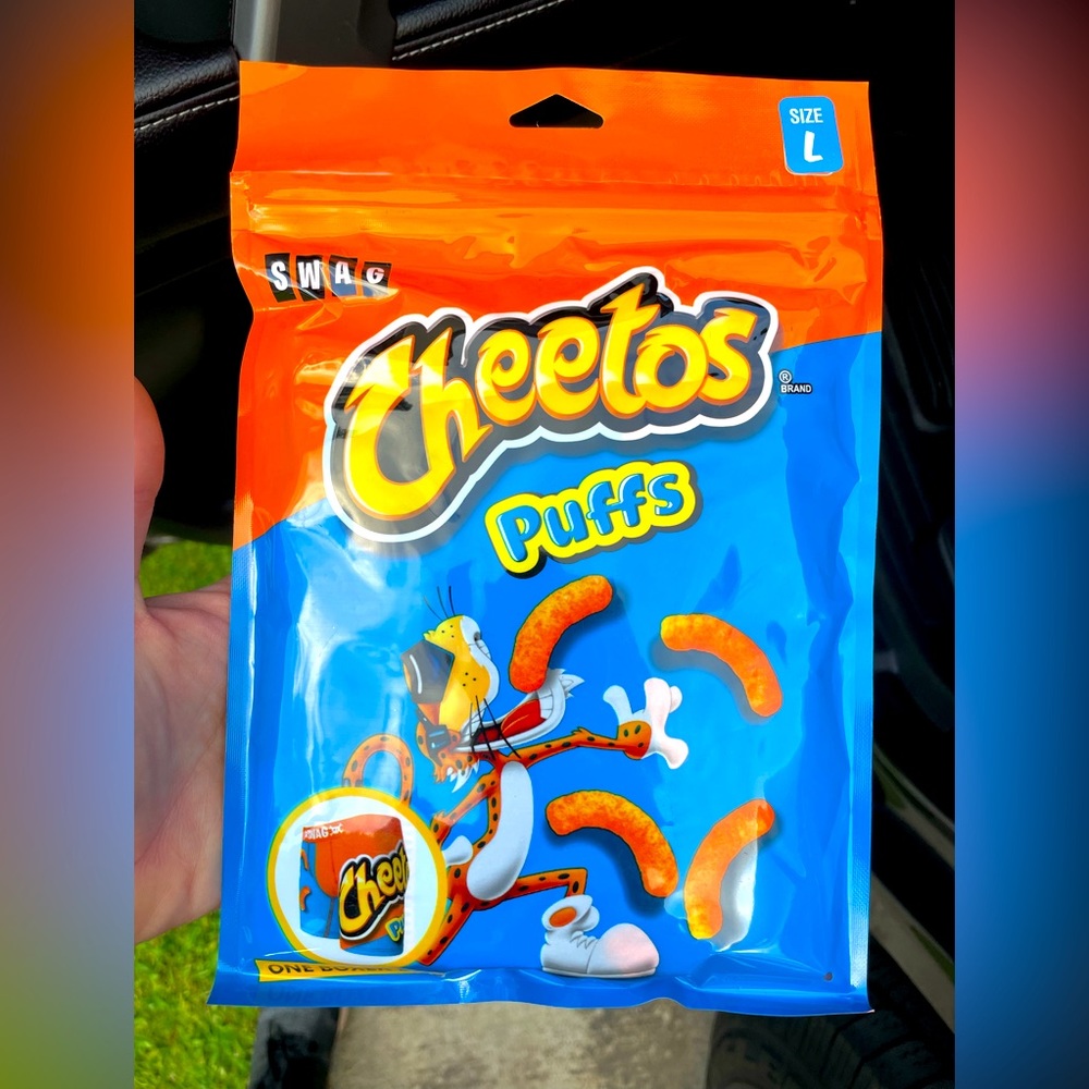 Boxers//Cheetos size large. Brand new never opened